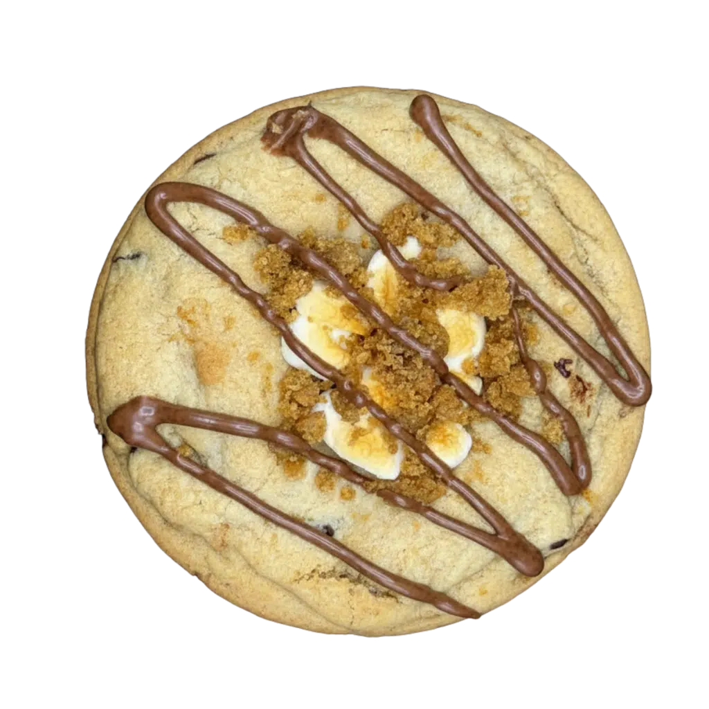 A graham chocolate cookie with a marshmallow filling, topped with toasted marshmallows, graham cracker crumble, and a drizzle of milk chocolate.