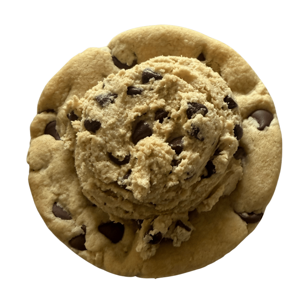 A gluten-free golden chocolate chip cookie topped with a scoop of edible cookie dough and mini chocolate chips.