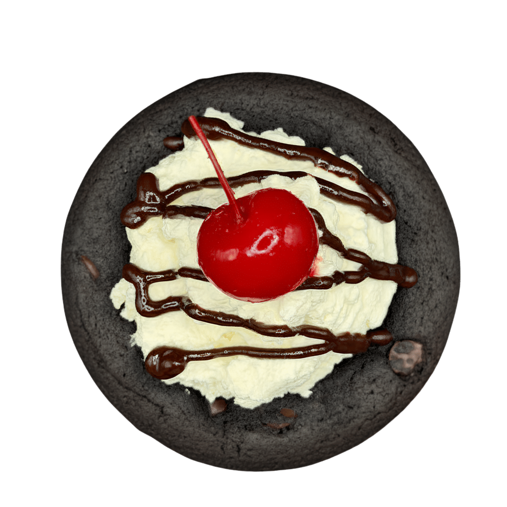 Hot Fudge Sundae | Gluten Free | Ice Cream Parlor Collection Gluten-free chocolate cookie topped with a swirl of whipped cream, chocolate drizzle, and a maraschino cherry.