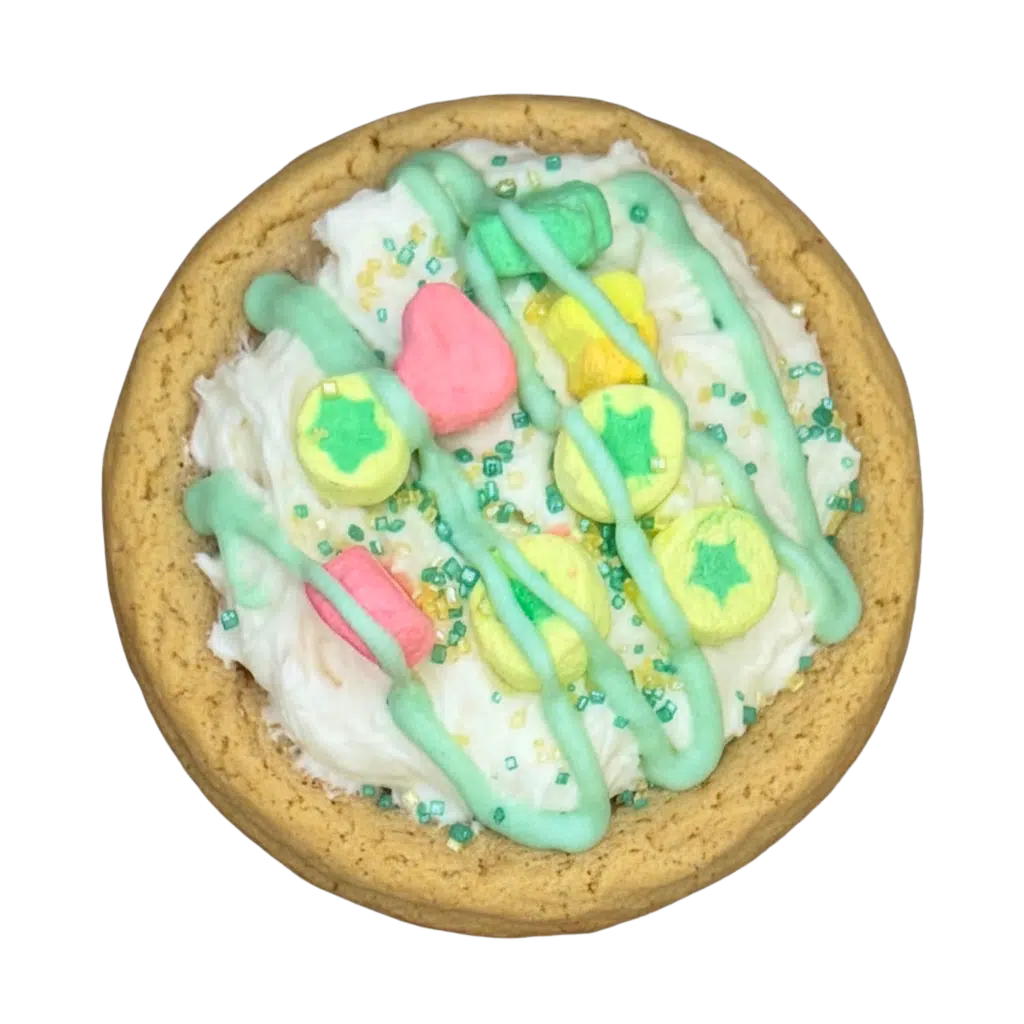 A Lucky Charms Marshmallow Dream cookie from the Cereal Milk Collection, topped with colorful marshmallow charms.