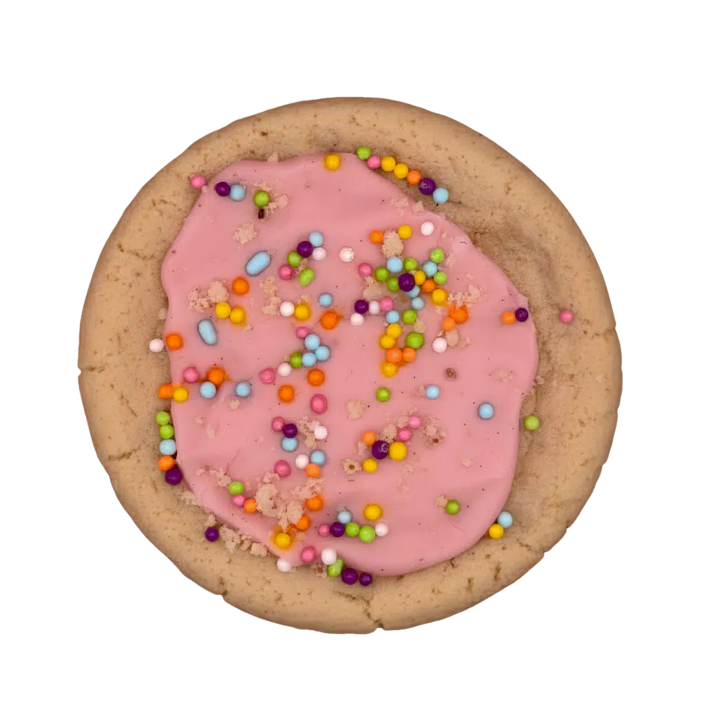 Gluten-free almond vanilla bean cookie topped with pink frosting, rainbow sprinkles, and buttery shortbread crumble.